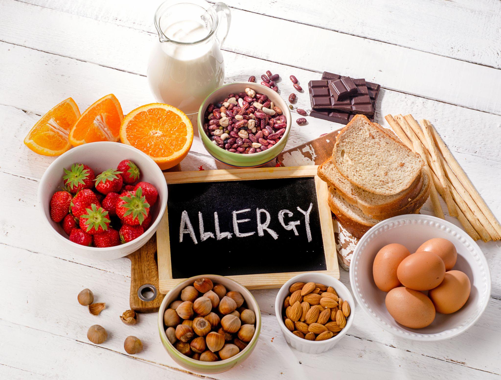 Allergic food on wooden background
